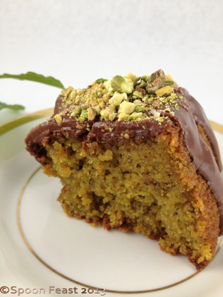 Pistachio cake with chocolate fondant and toasted chopped pistachios